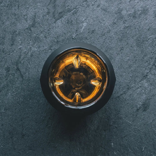 Blind nosing whisky glass viewed from above. 